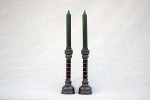 Pair of Steel Candlesticks shown with taper candles
