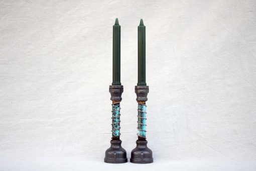 Pair of Patina Candlesticks shown with taper candles
