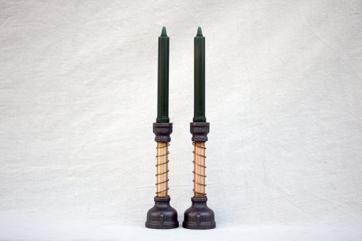 Pair of Brass Candlesticks shown with taper candles